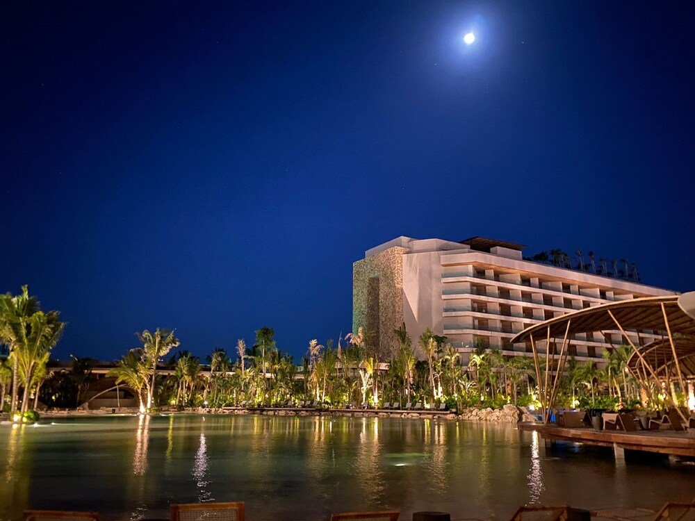 Impression Moxché by Secrets rooftop infinity pool overlooking the surroundings