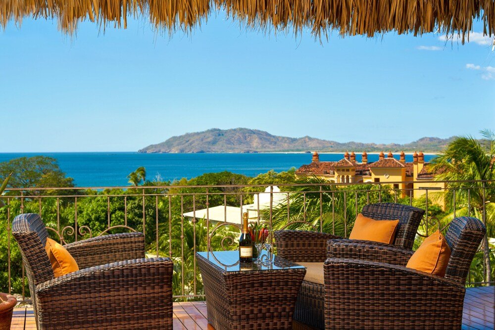 Pool area with cabanas at Jardín del Edén Boutique Hotel